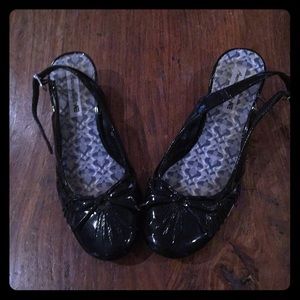 Girls American Eagle patent leather shoes.